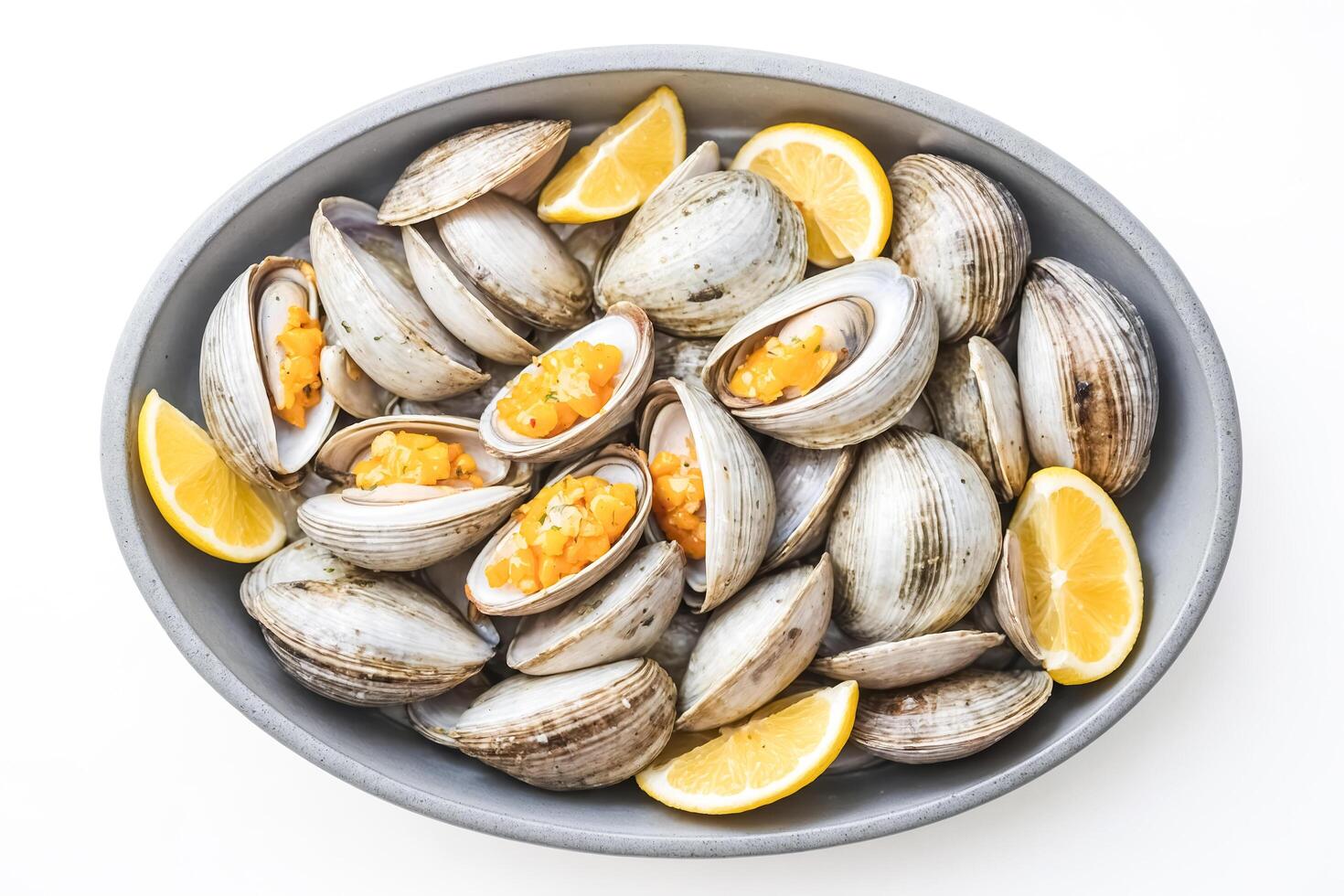 Fresh Clams with Lemon in a Bowl photo