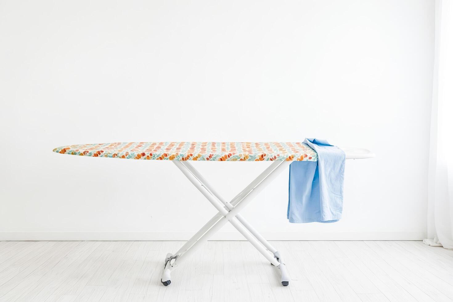 Ironing Board with Blue Shirt photo