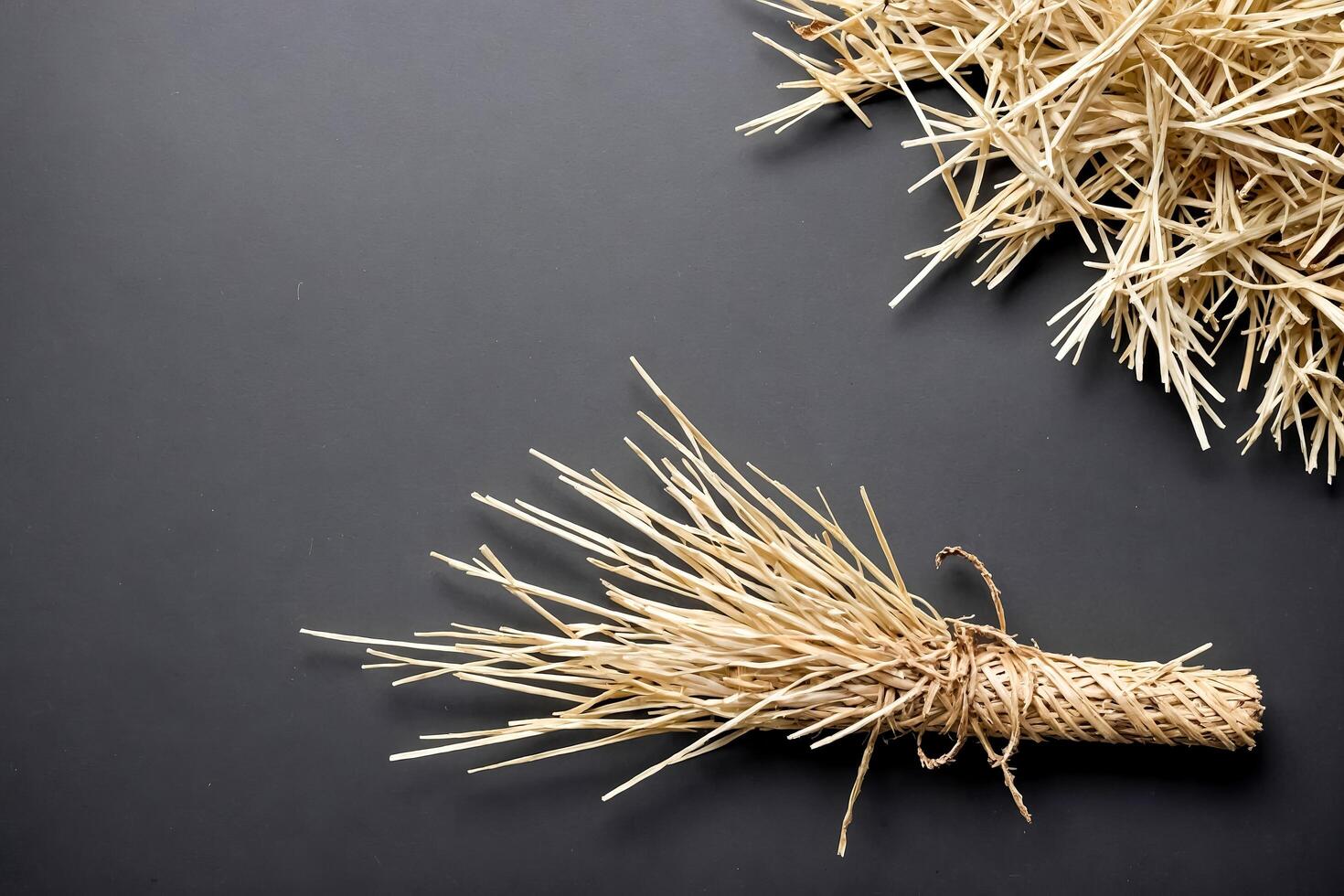 Dried Straw on Black Background photo