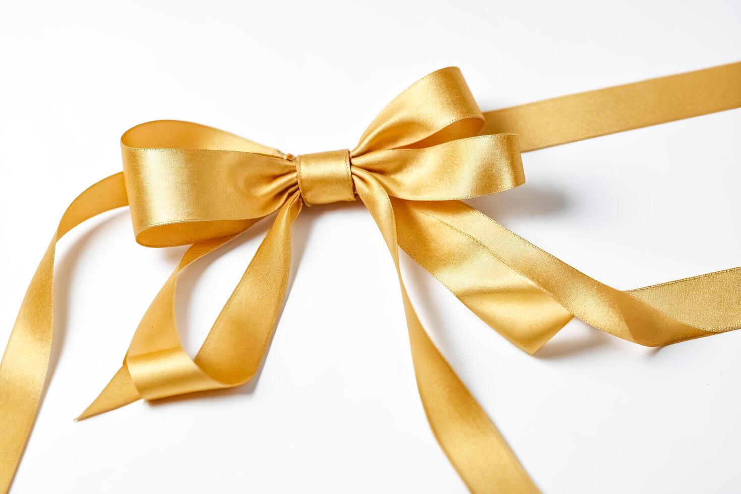 Golden Bow on White Background photo