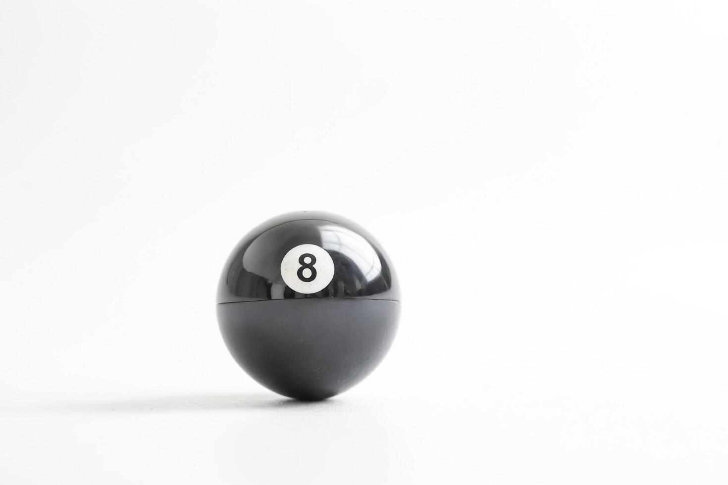 Black 8 Ball on White Background photo