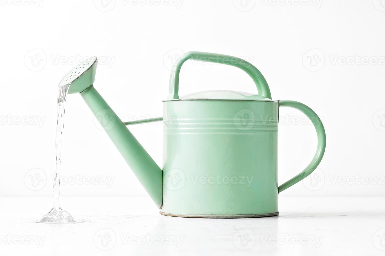 Vintage Green Watering Can Pouring Water photo