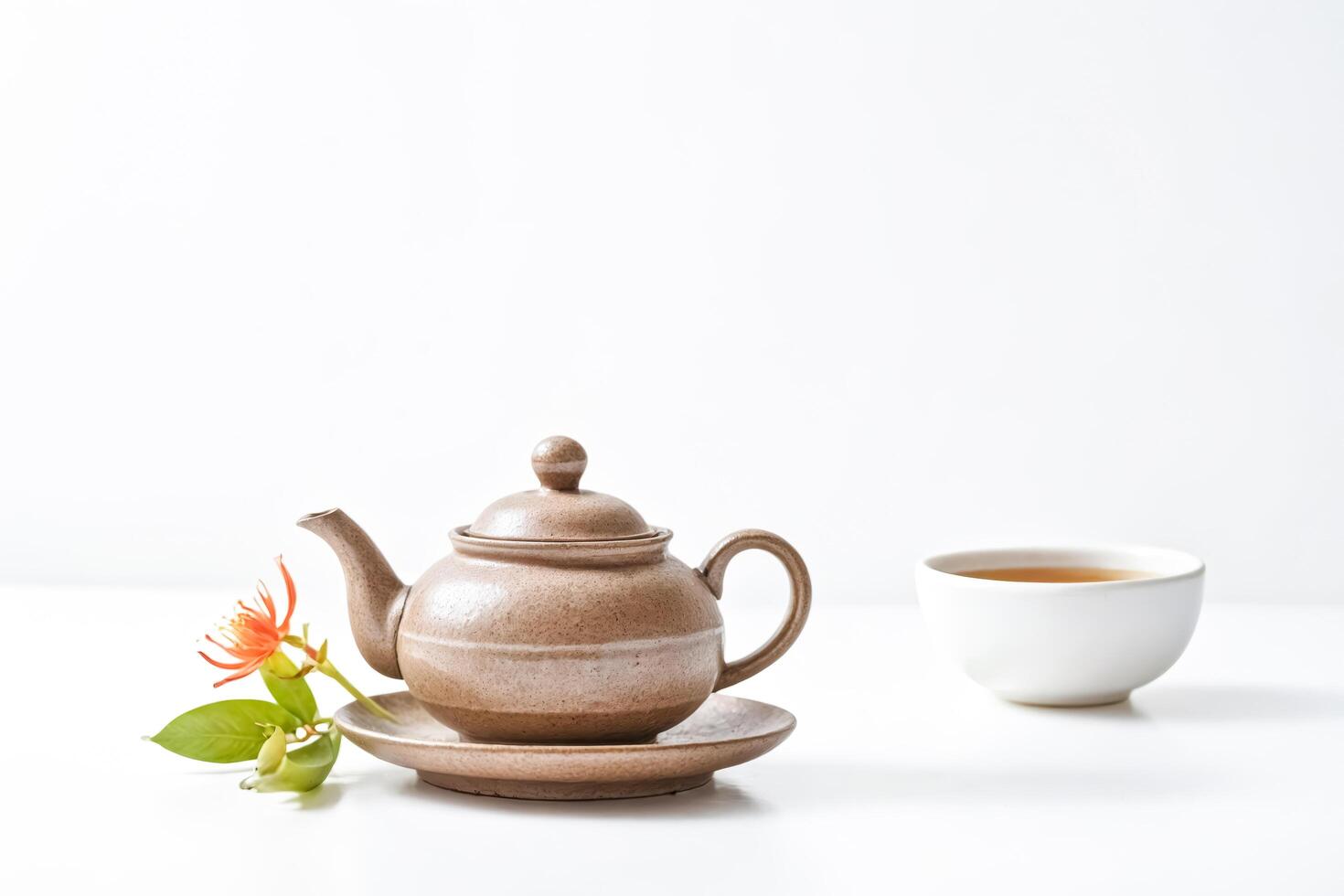 Teapot and Cup on White Background photo