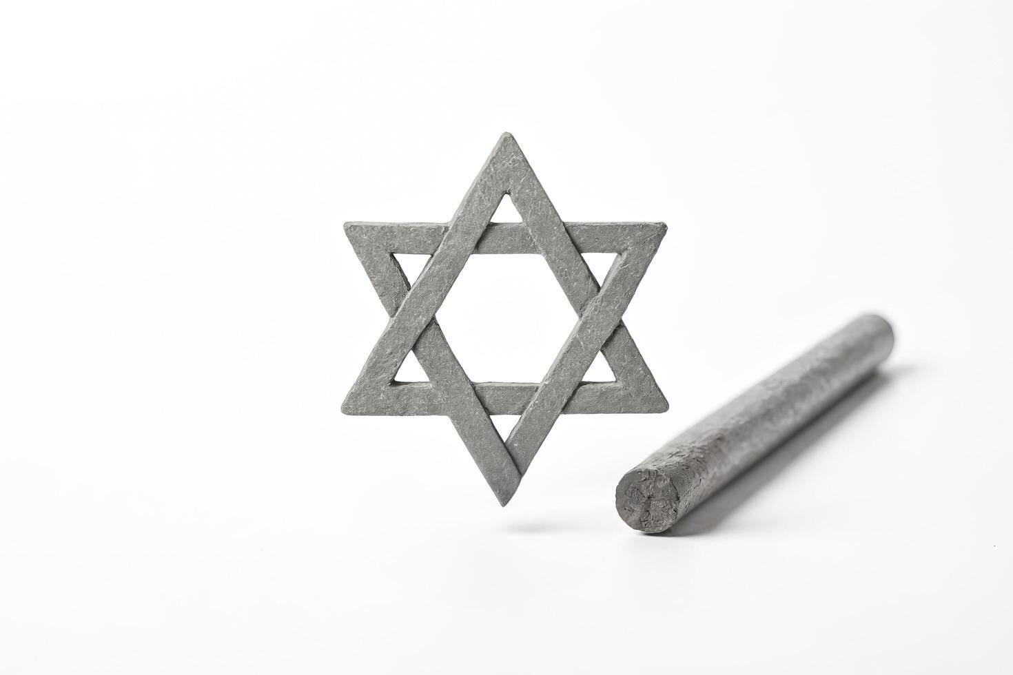 Star of David and a Cylinder on a White Background photo