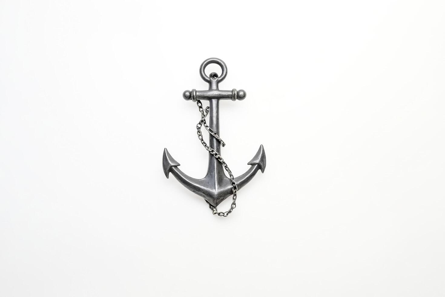 Black Anchor with Chain on White Background photo