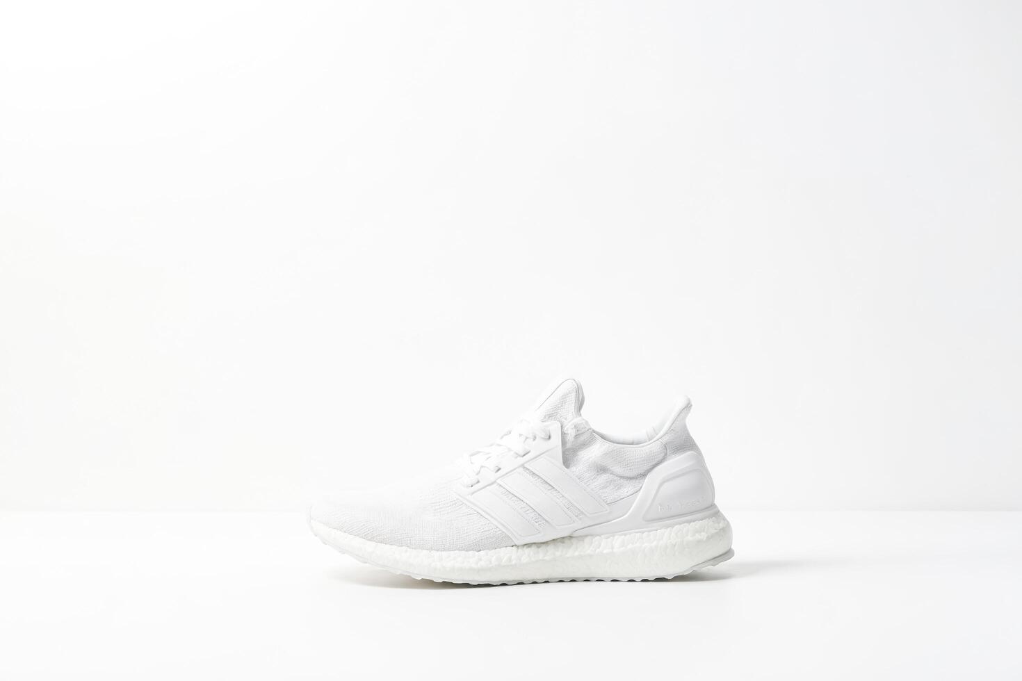 White Adidas Ultraboost Sneakers photo