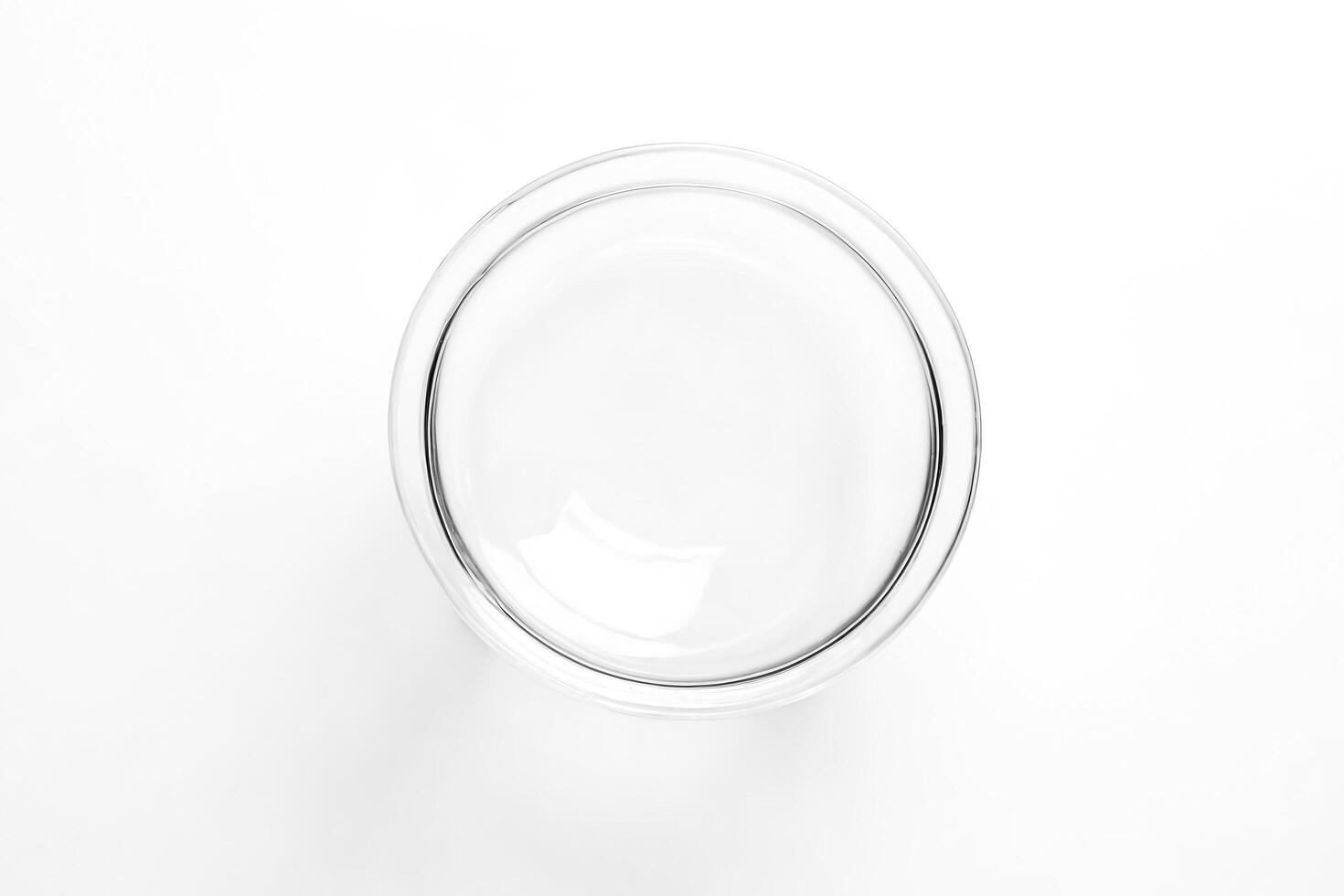 Empty Glass Bowl on White Background photo