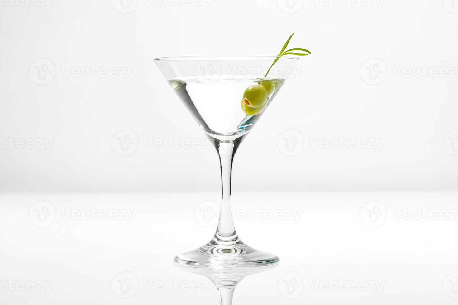 Martini Cocktail with Olive Garnish photo