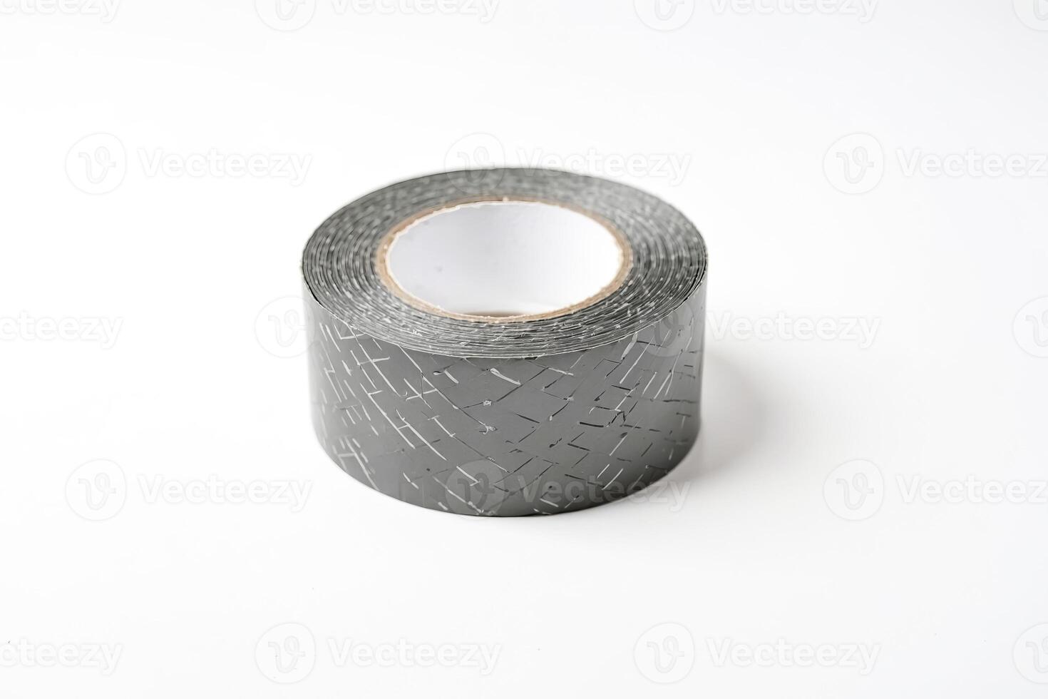Roll of black electrical tape with a textured pattern photo