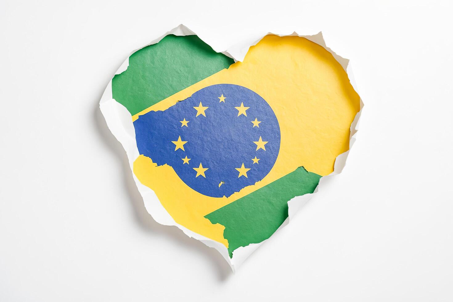 Brazil Flag Heart Shaped Hole in Paper photo