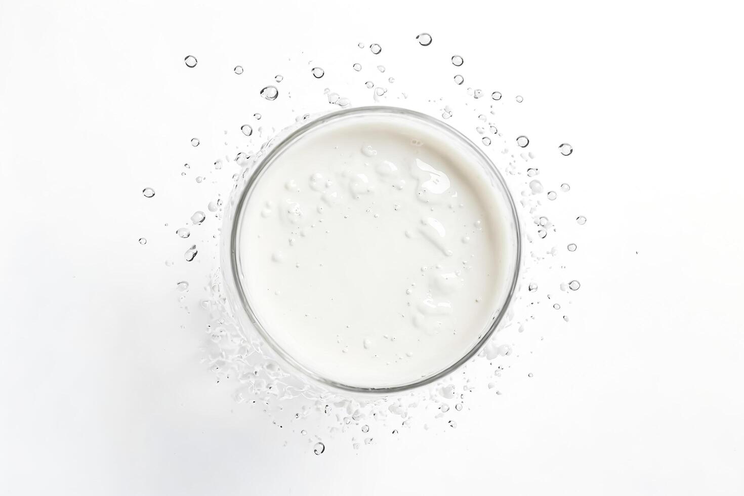 Milk splash in a glass photo