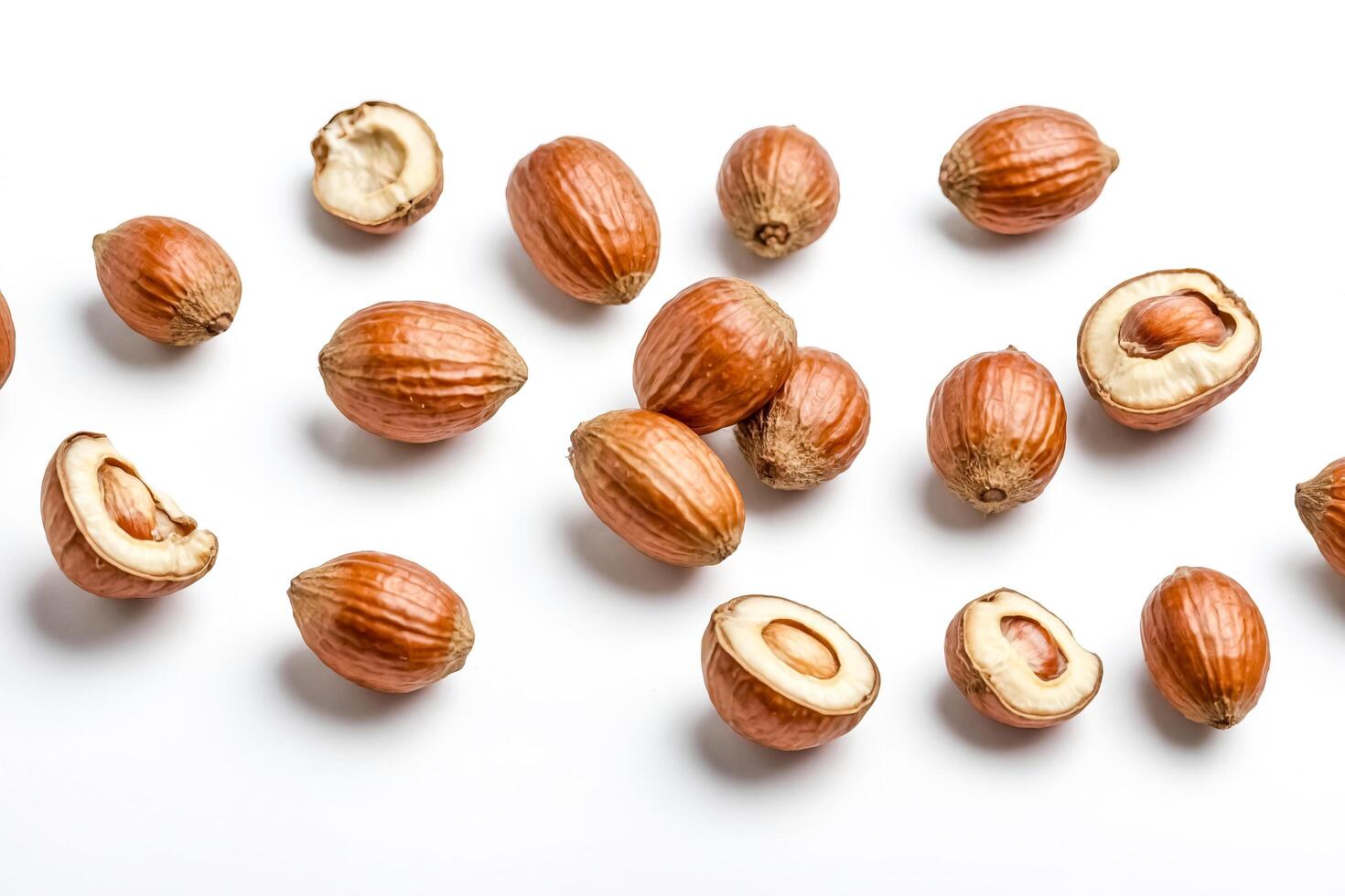 Closeup of Hazelnuts Isolated on White Background photo