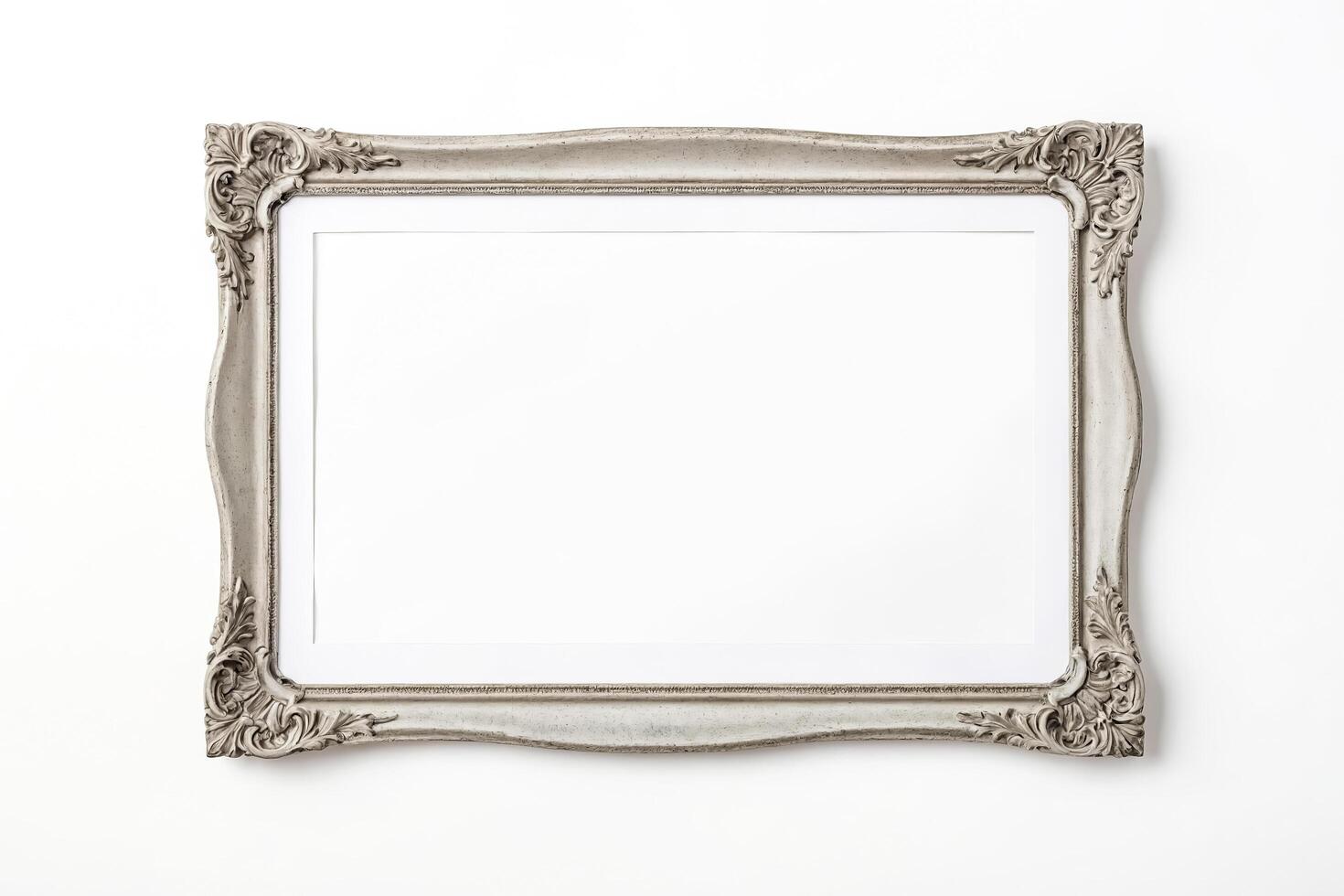 Empty Ornate Silver Picture Frame Isolated On White photo