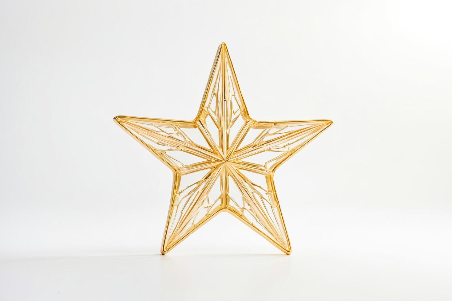 Golden Star Ornament Isolated on White Background photo