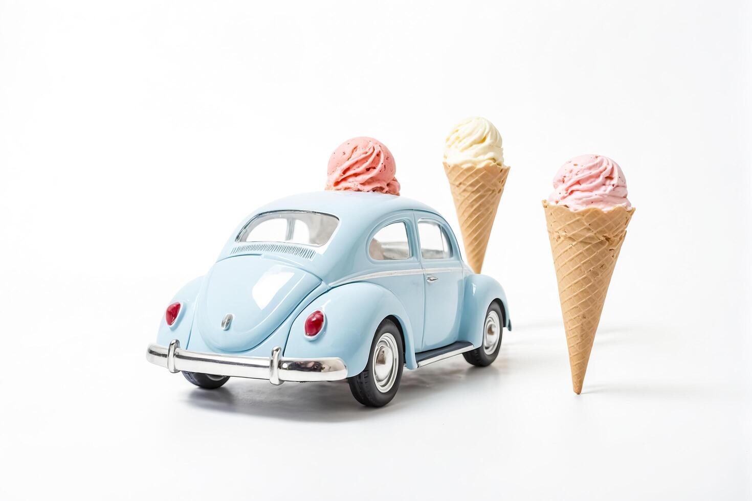 Blue Vintage Car With Ice Cream Cones photo