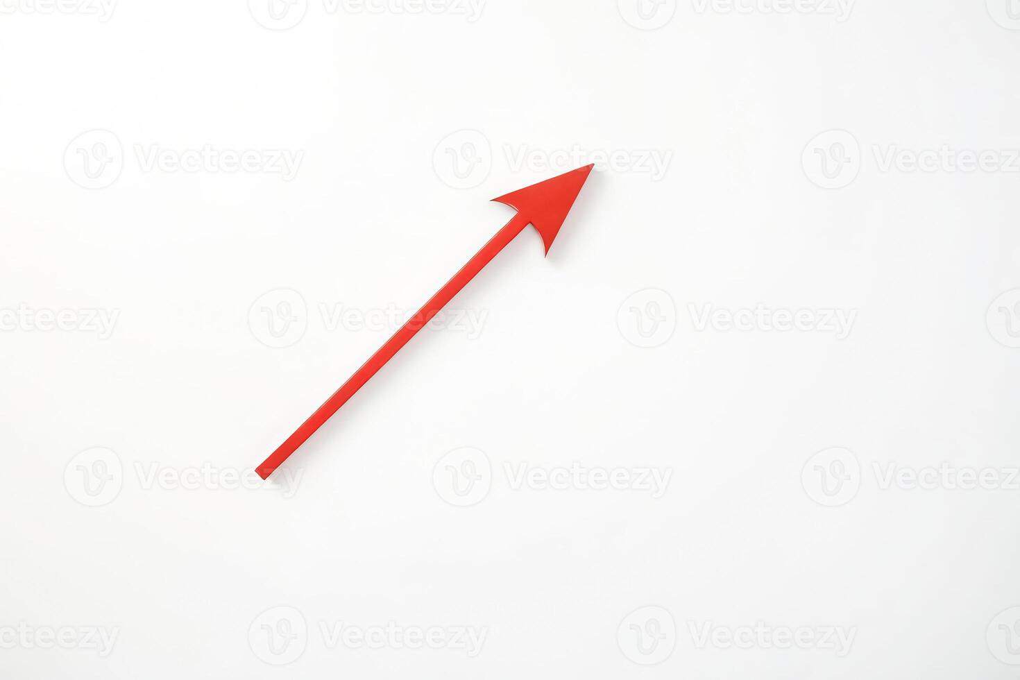 Red Arrow Pointing Upwards On White Background photo