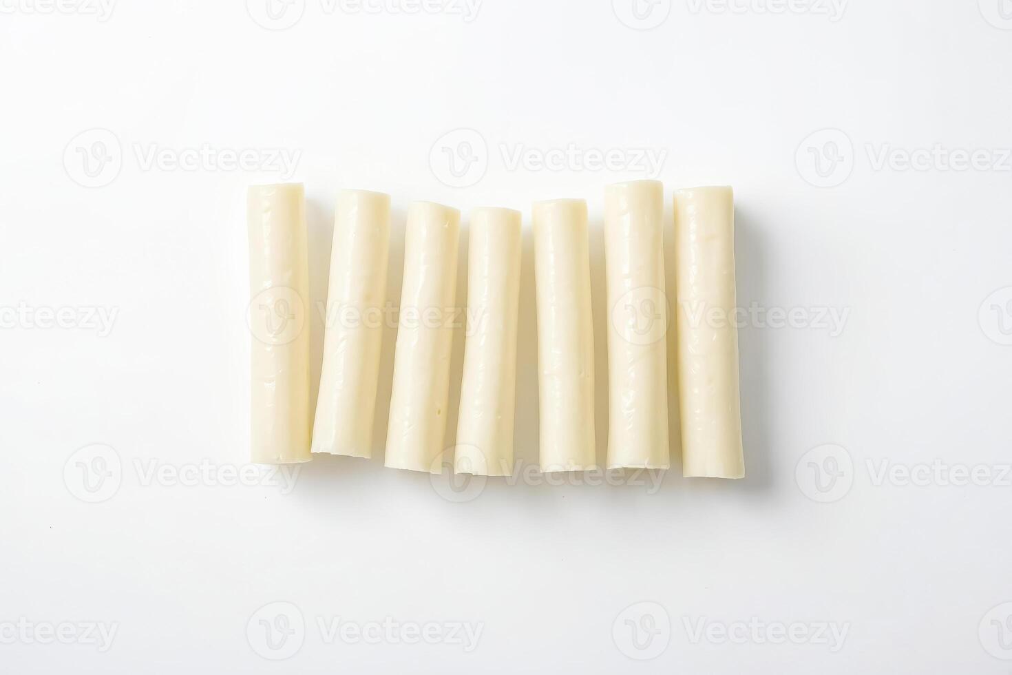 String Cheese Sticks on White Background photo