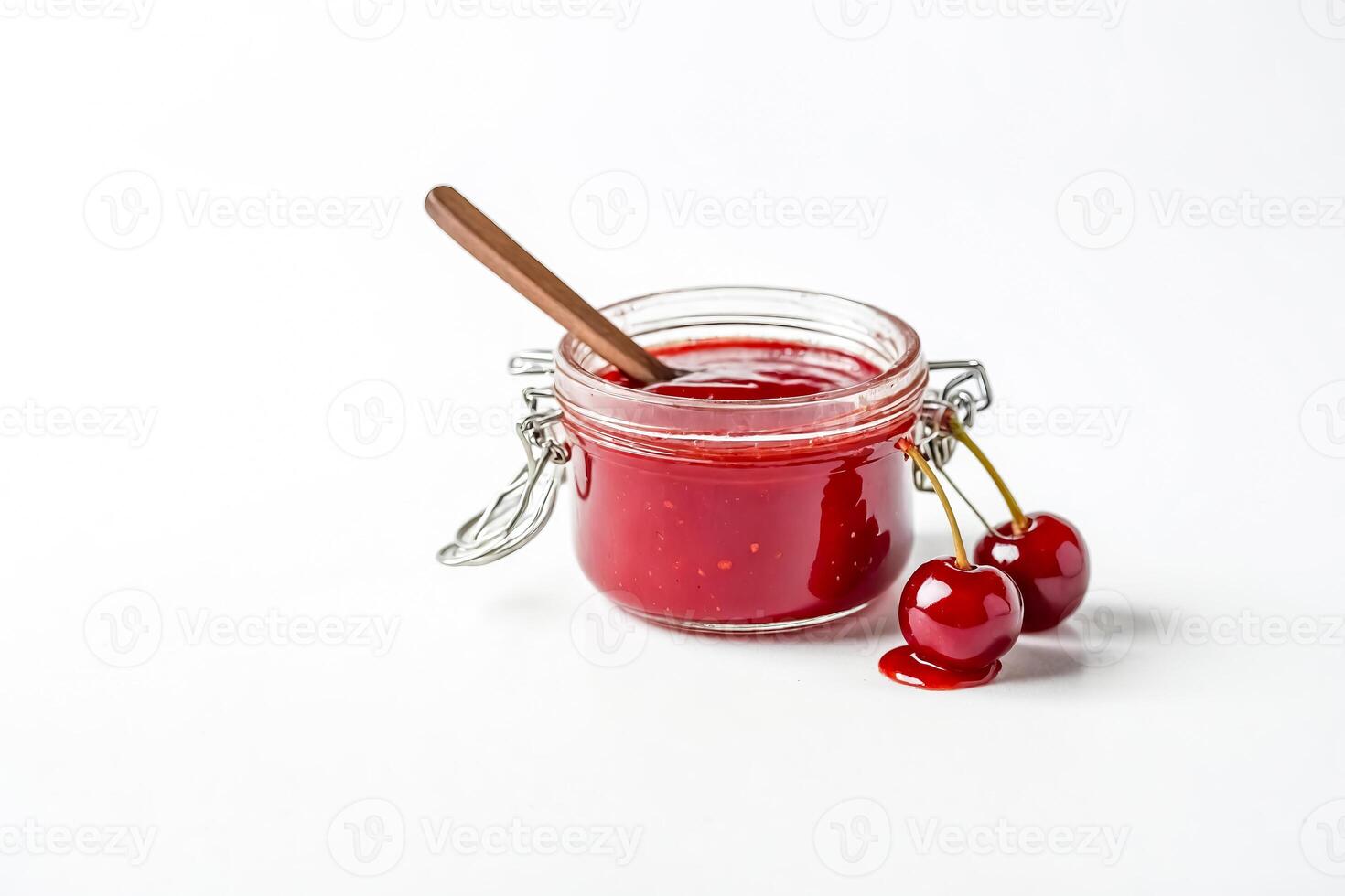 Cherry Jam in a Glass Jar with Spoon and Cherries photo