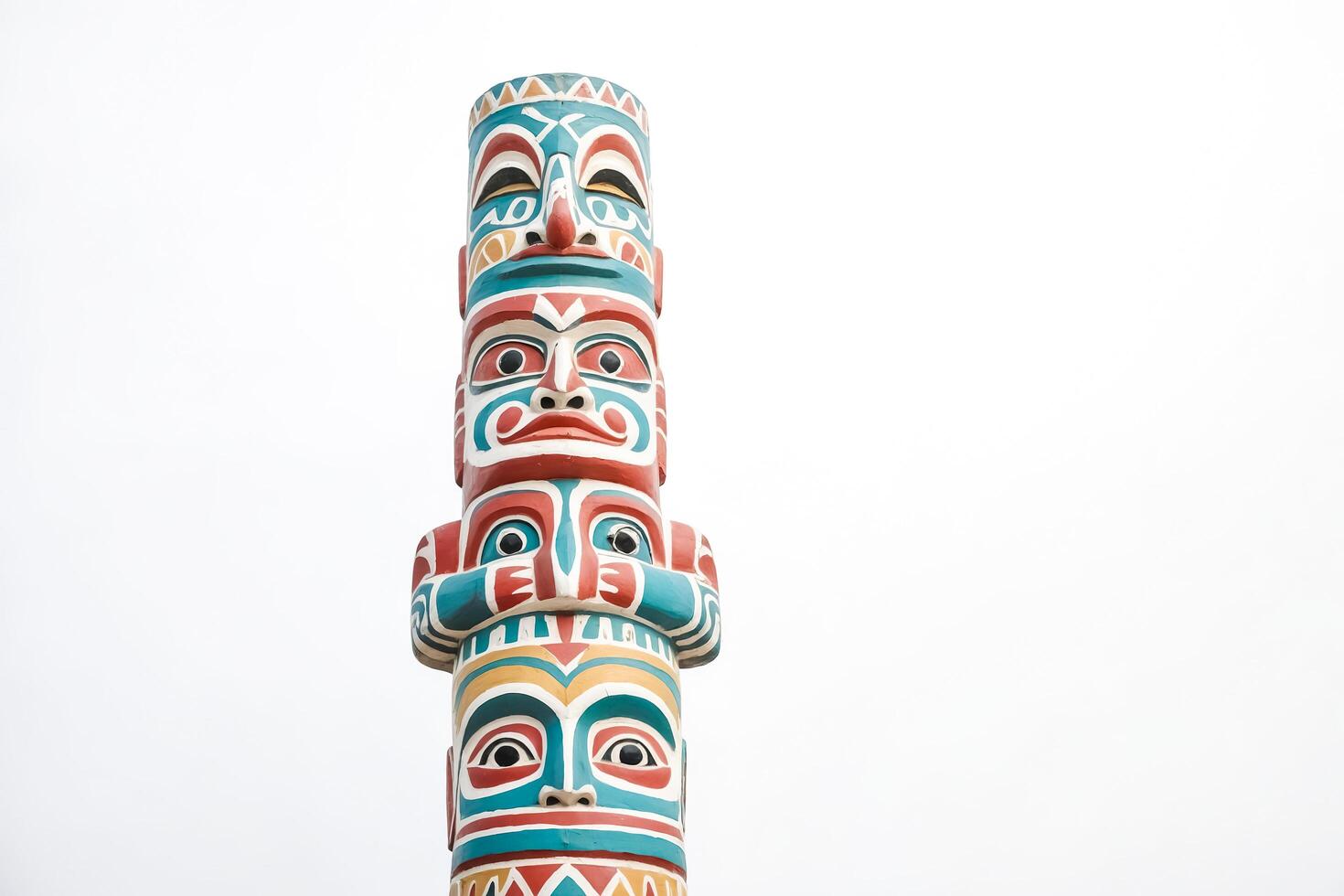 Native American Totem Pole with Colorful Faces photo