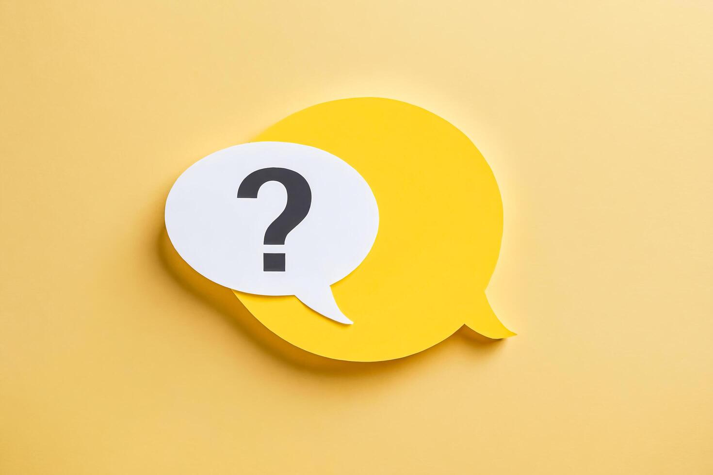 Question Mark in Speech Bubble on Yellow Background photo