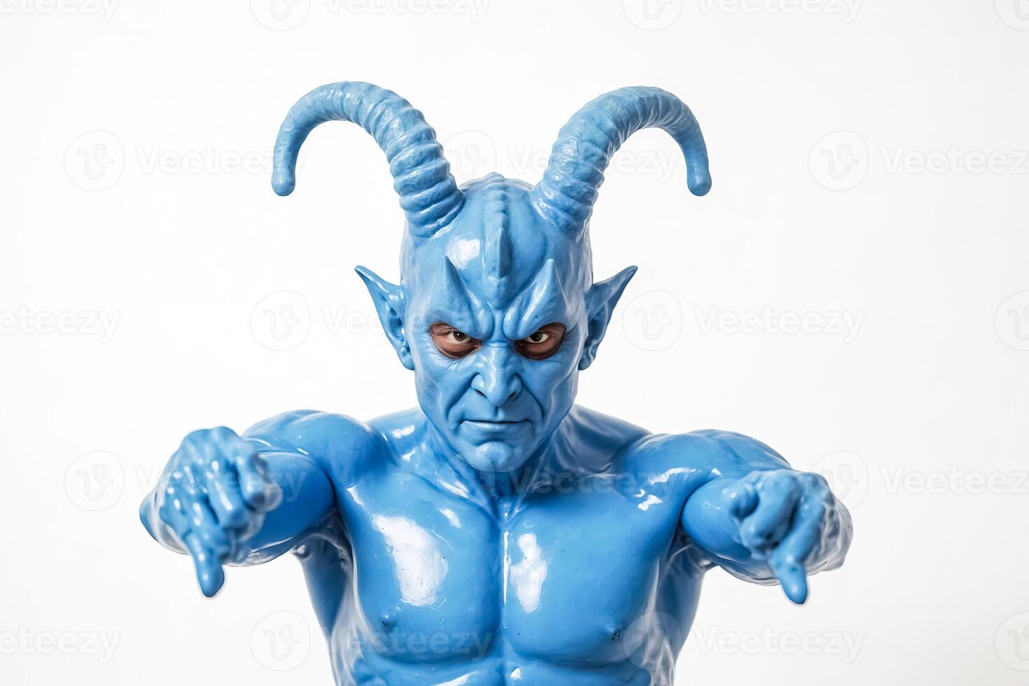 Blue Demon with Horns Points Forward photo