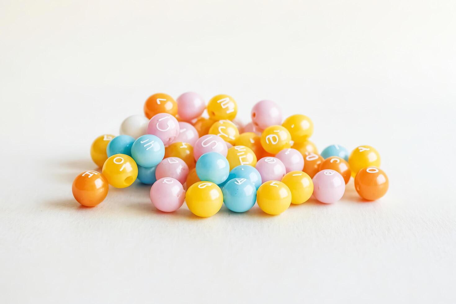 Colorful Plastic Beads with Letters photo