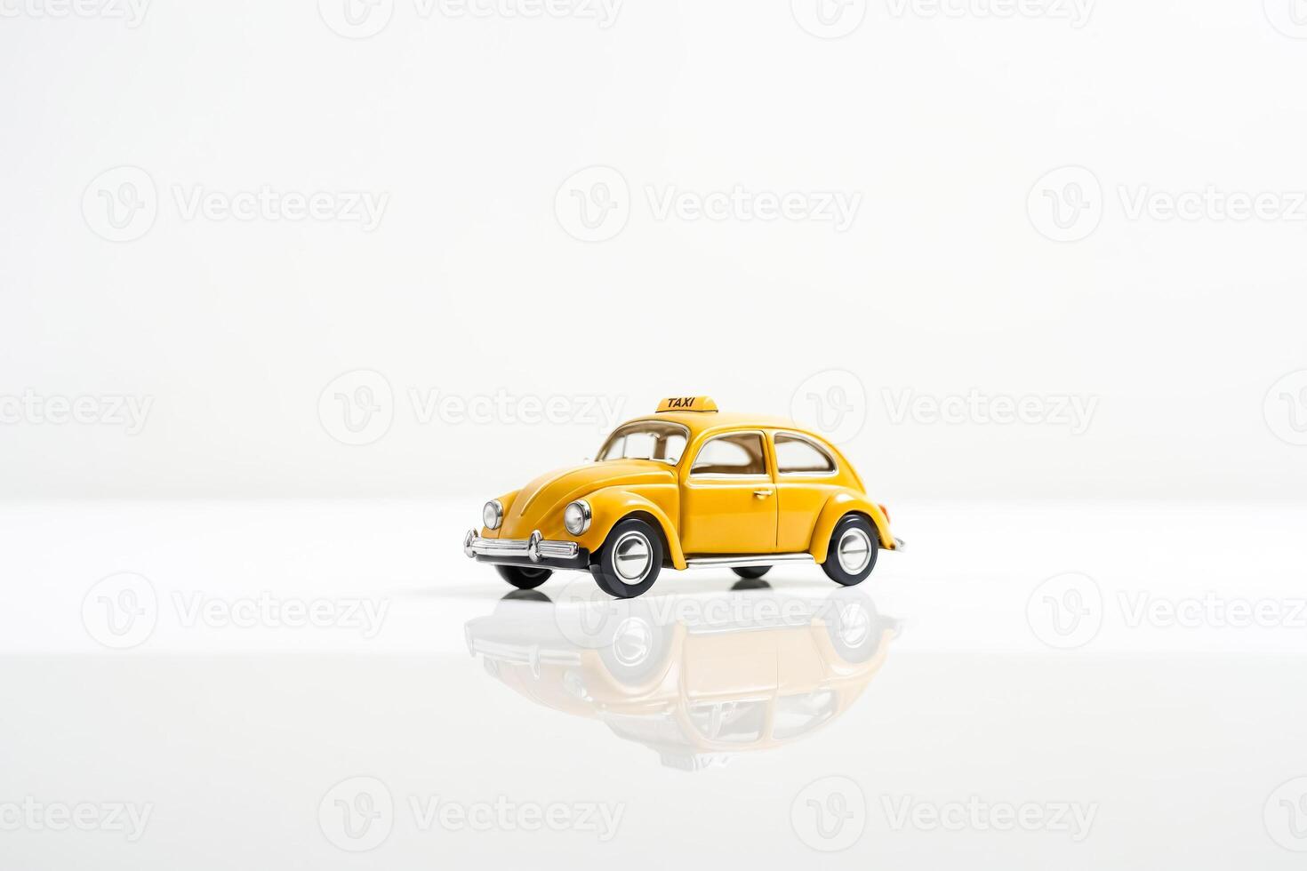Yellow Vintage Taxi Car Toy on White Background photo