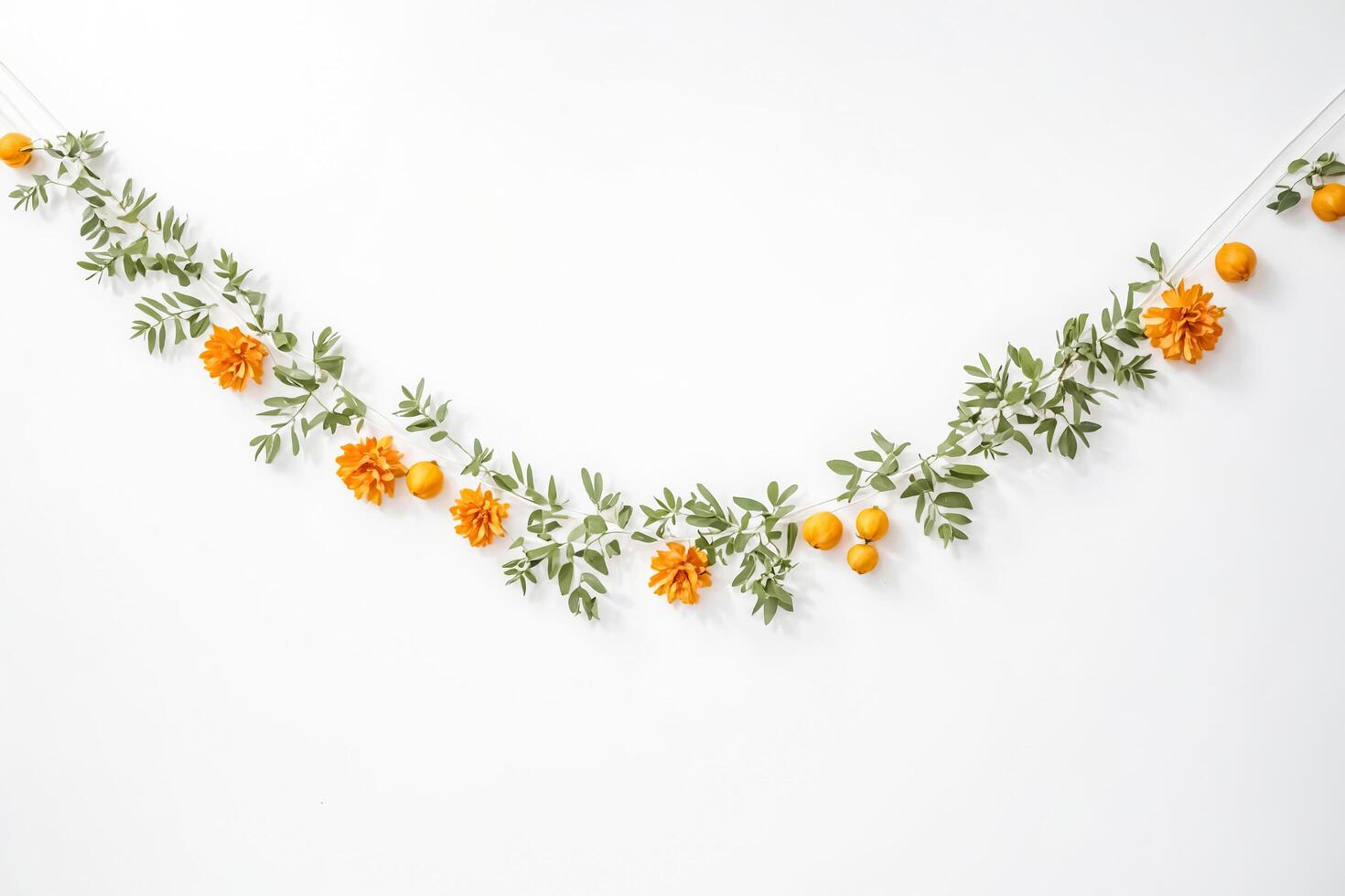 Floral garland with orange flowers and leaves photo