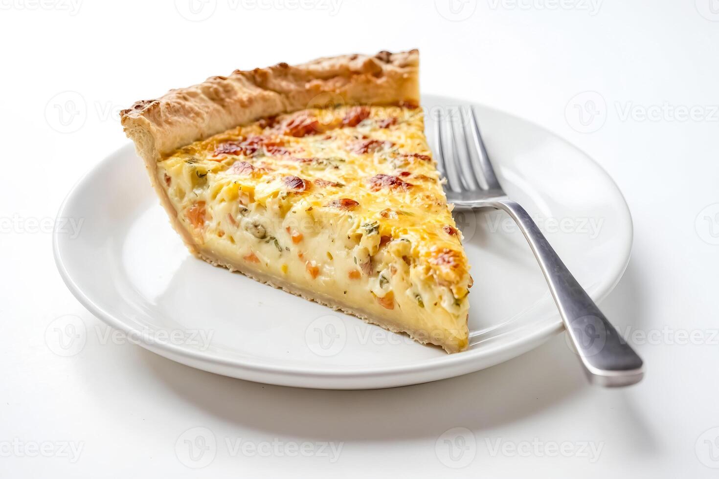 Slice of Quiche Lorraine on a White Plate with Fork photo