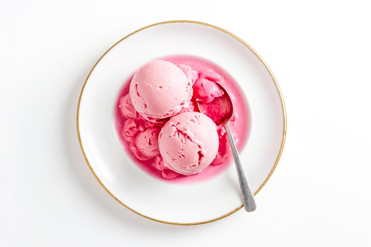 Pink Ice Cream With Sauce On A White Plate photo