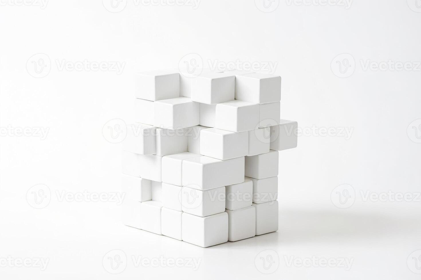 White Cubes Stacked in an Abstract Arrangement on White Background photo