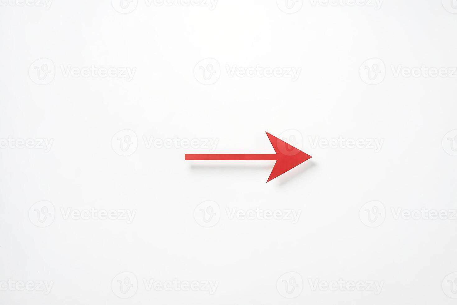 Red Arrow on White Background photo