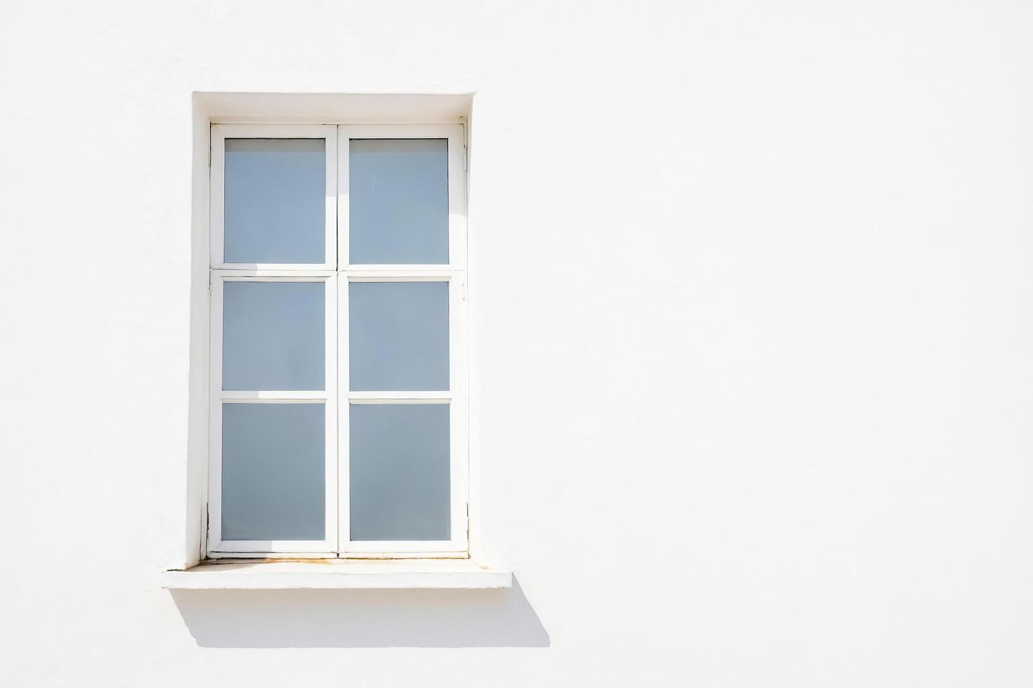 White window on white wall photo