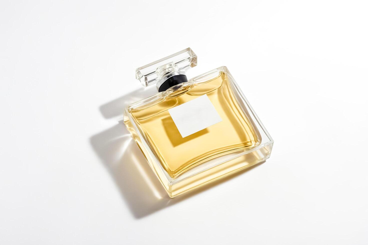 Perfume Bottle with Blank Label on White Background photo