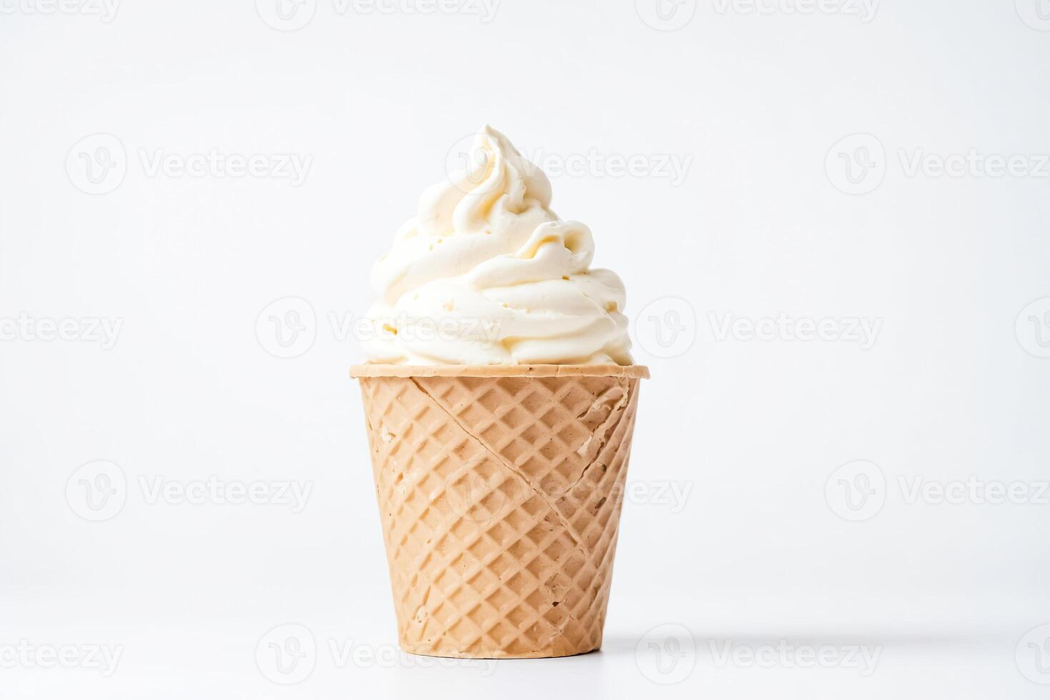Vanilla Ice Cream in a Waffle Cone on White Background photo