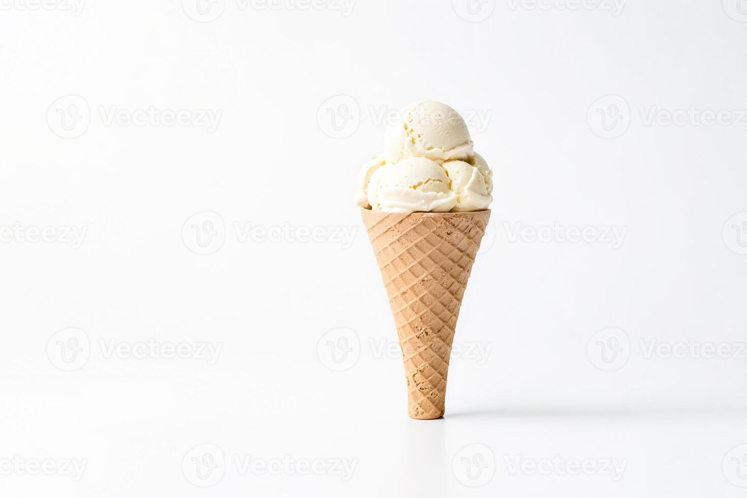 Vanilla Ice Cream Cone on White Background photo