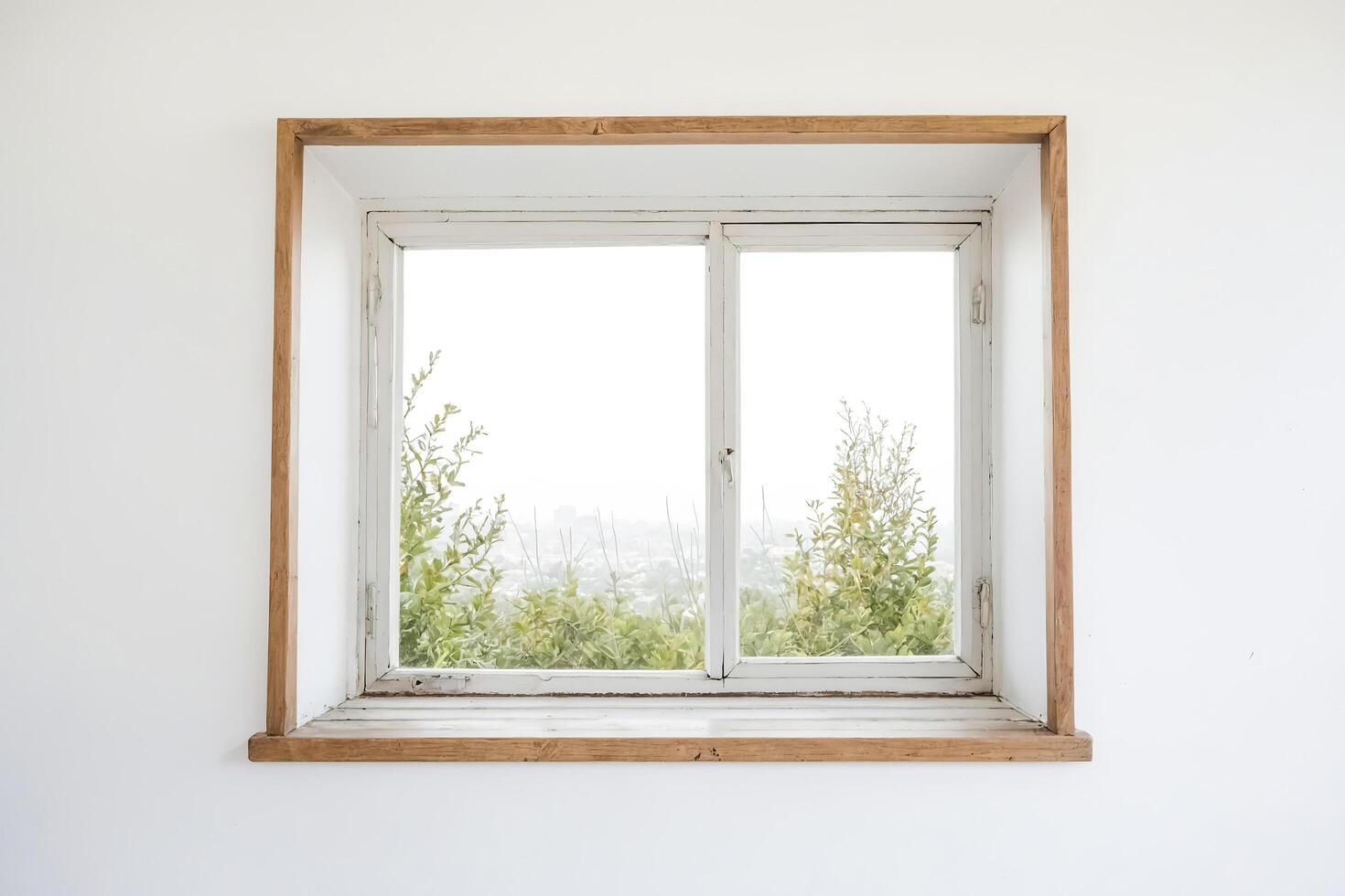 Window with a view of a city photo
