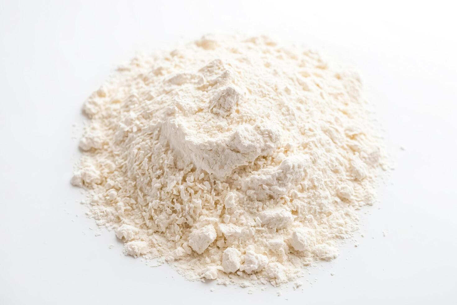 Close-up of white powder on white background photo