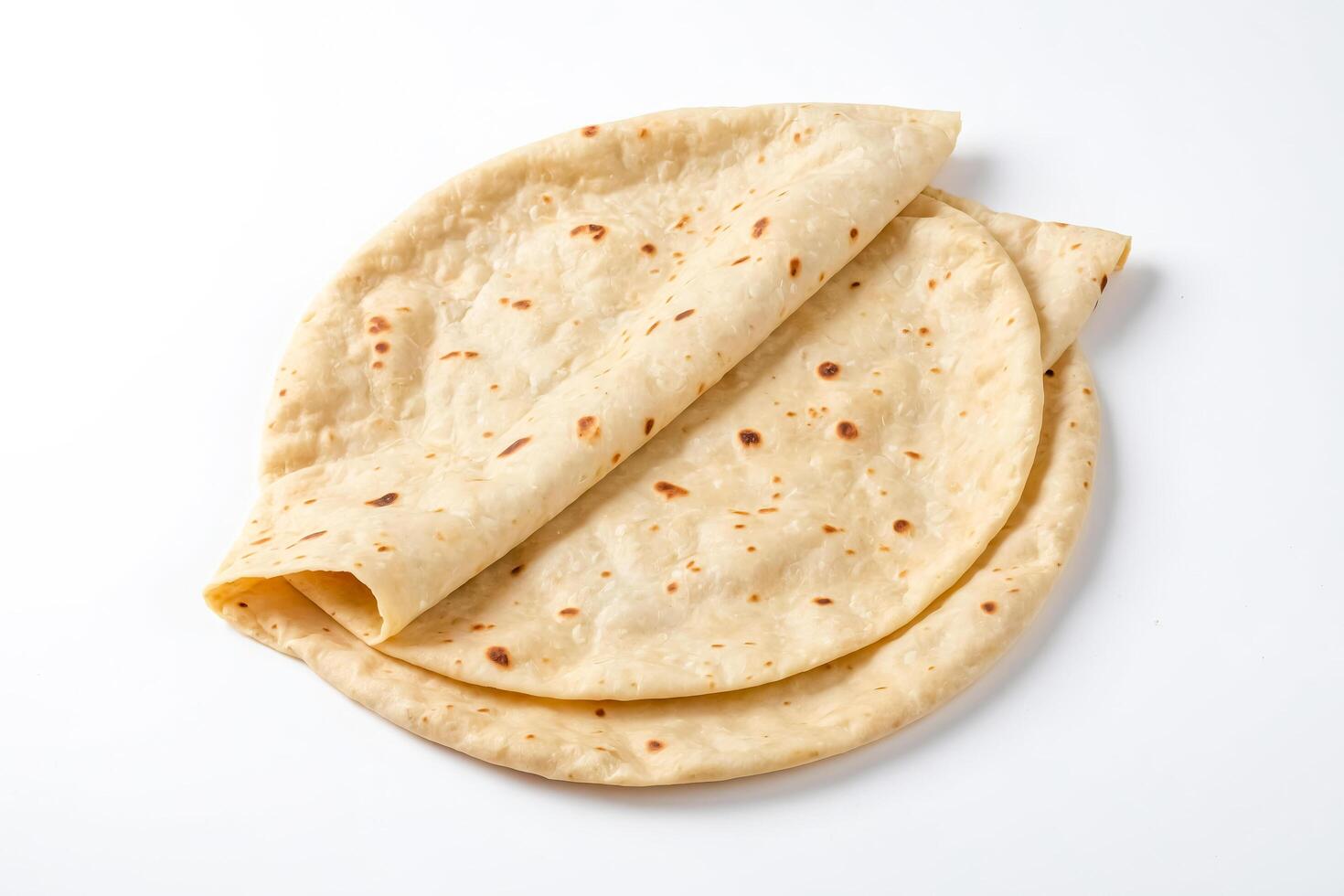 Close-up of Two Tortillas on White Background photo