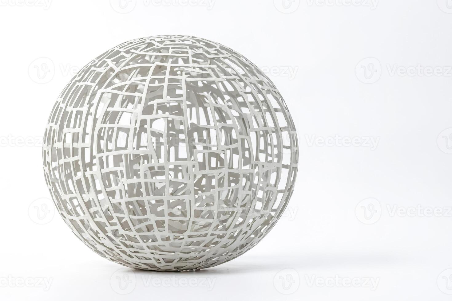 Abstract White Sphere with Interlocking Lattice Pattern photo