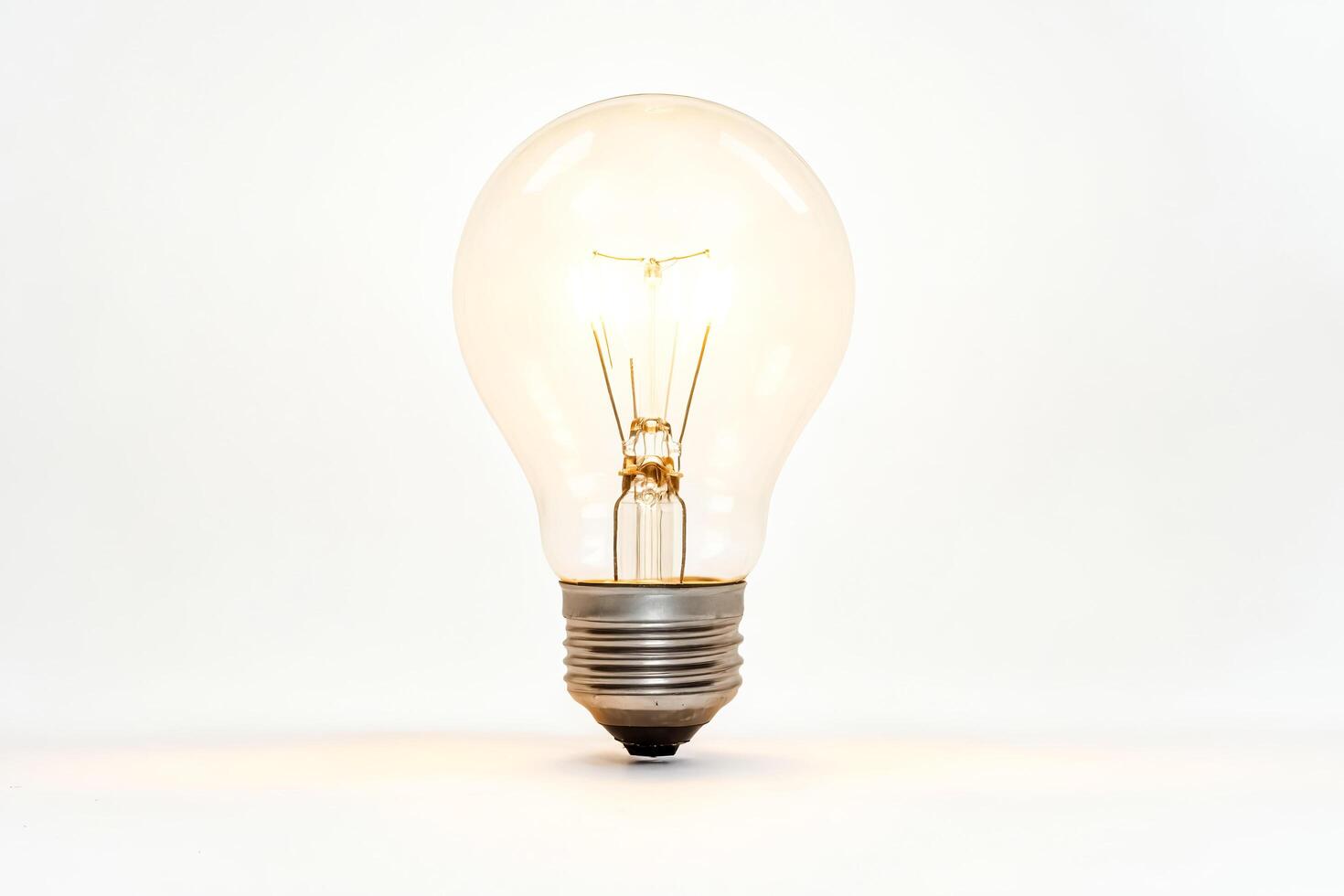 Closeup of a light bulb on a white background photo