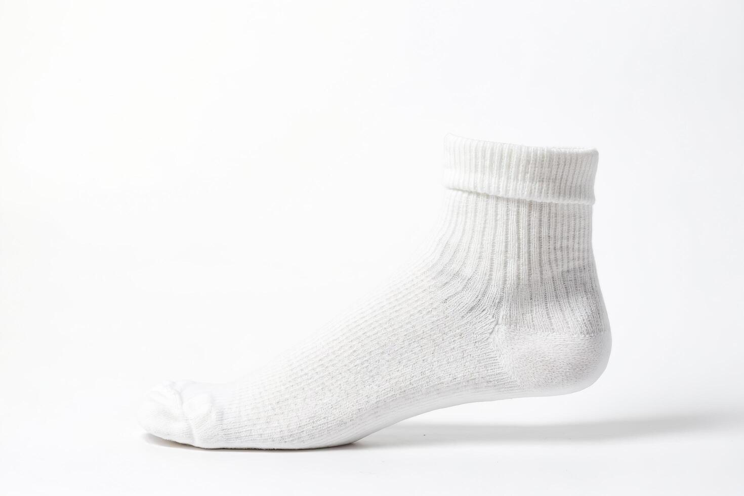 White Cotton Sock on White Background photo
