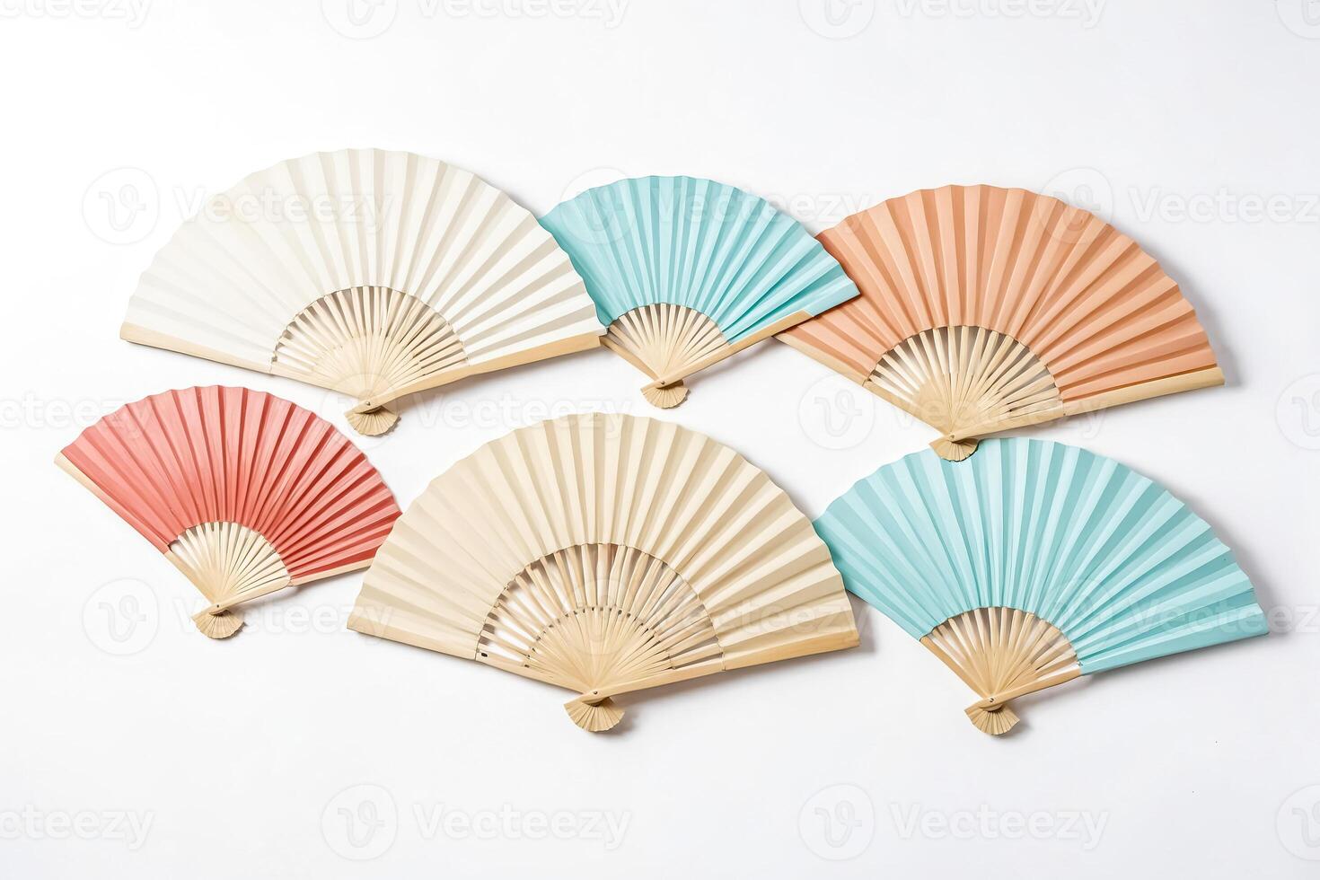Colorful Folding Fans On White Background photo