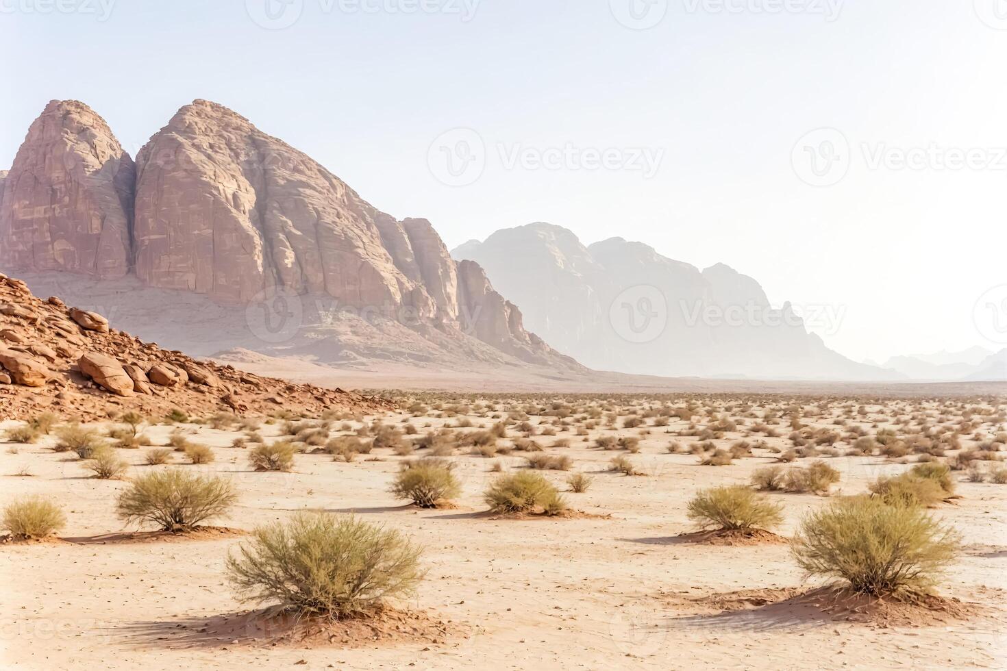 Wadi Rum Desert Landscape with Mountain Range in the Background photo
