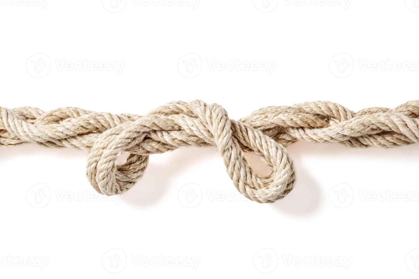 Beige Rope with a Knot on a White Background photo