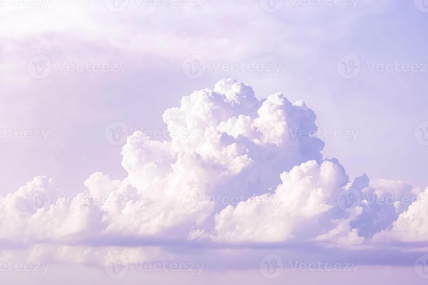 White Puffy Clouds in a Lavender Sky photo
