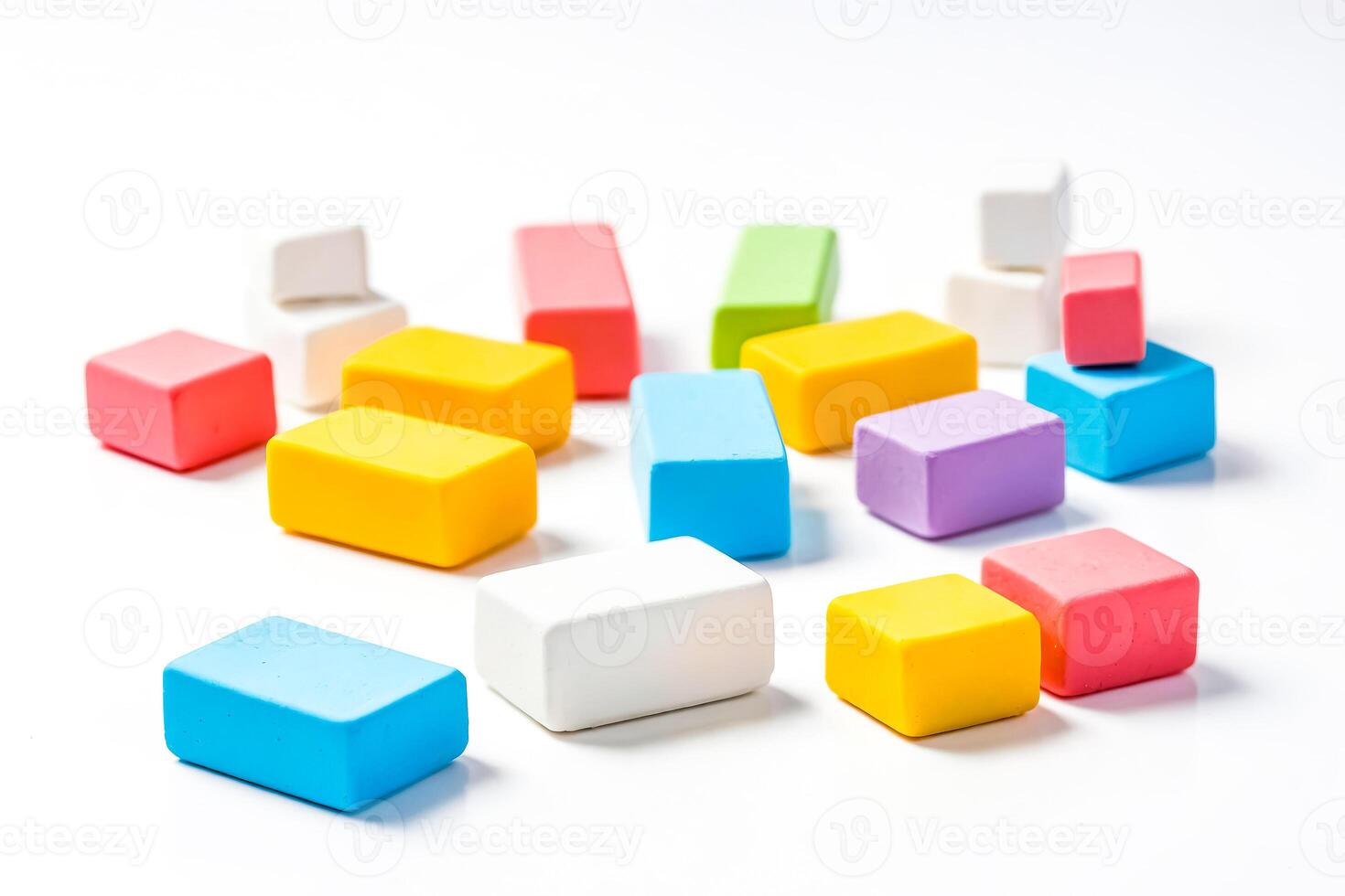 Colorful blocks scattered on a white background photo