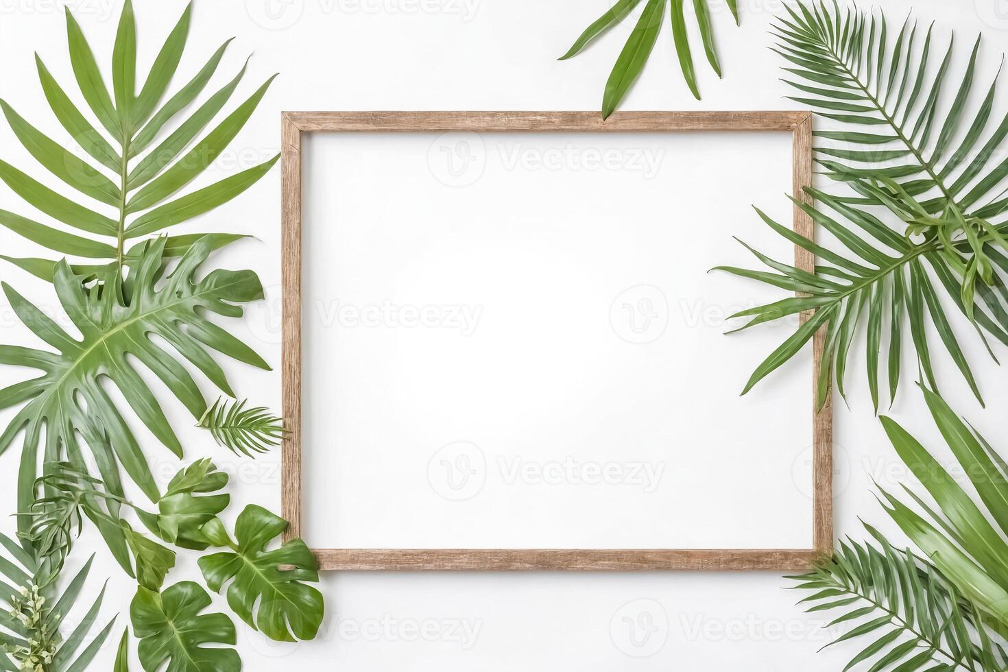 Wooden Frame with Tropical Leaves on White Background photo