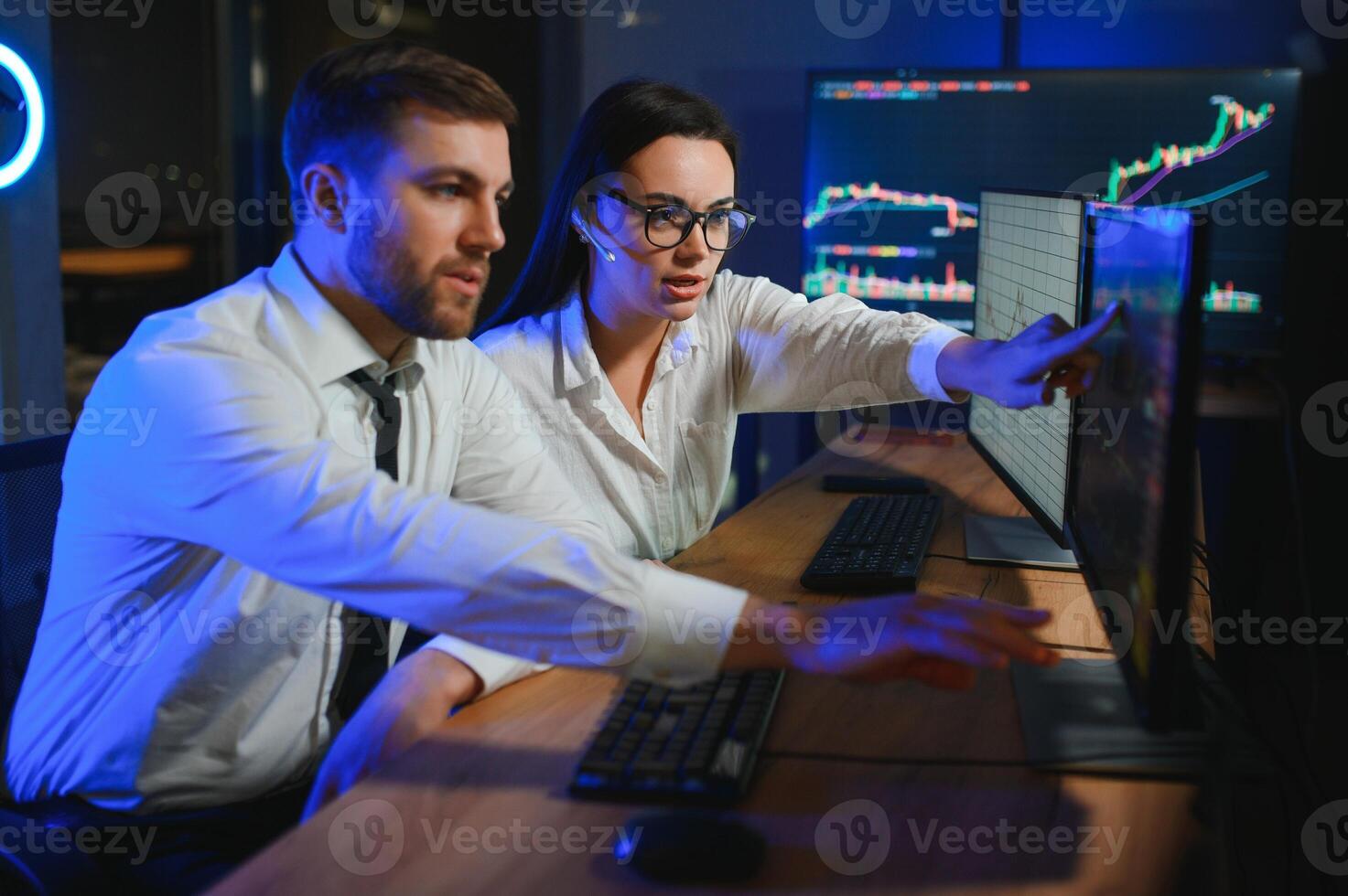 Business team investment working with computer, planning and analyzing graph stock market trading with stock chart data photo