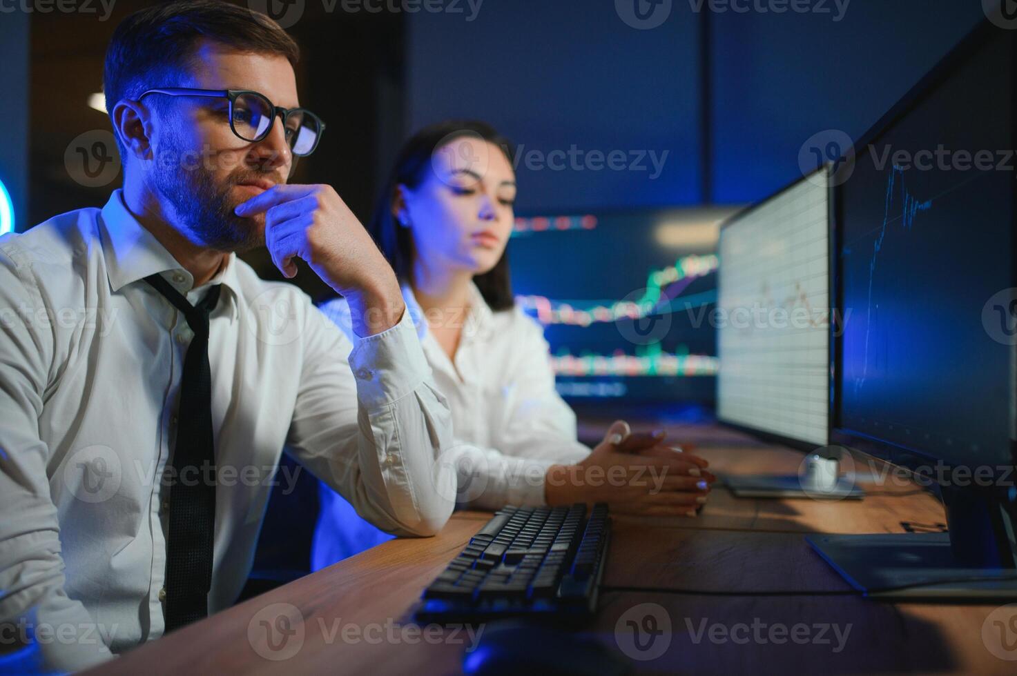 Business team investment working with computer, planning and analyzing graph stock market trading with stock chart data photo